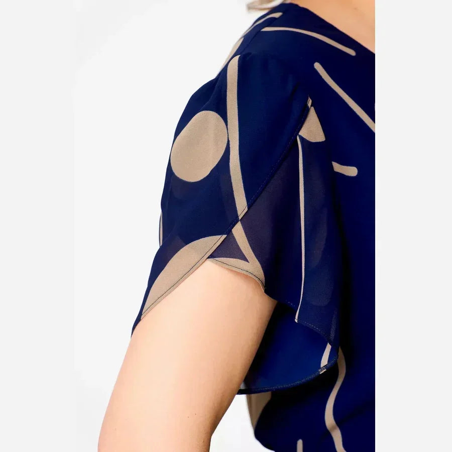 Lucie | Robe midi à pois bleu marine